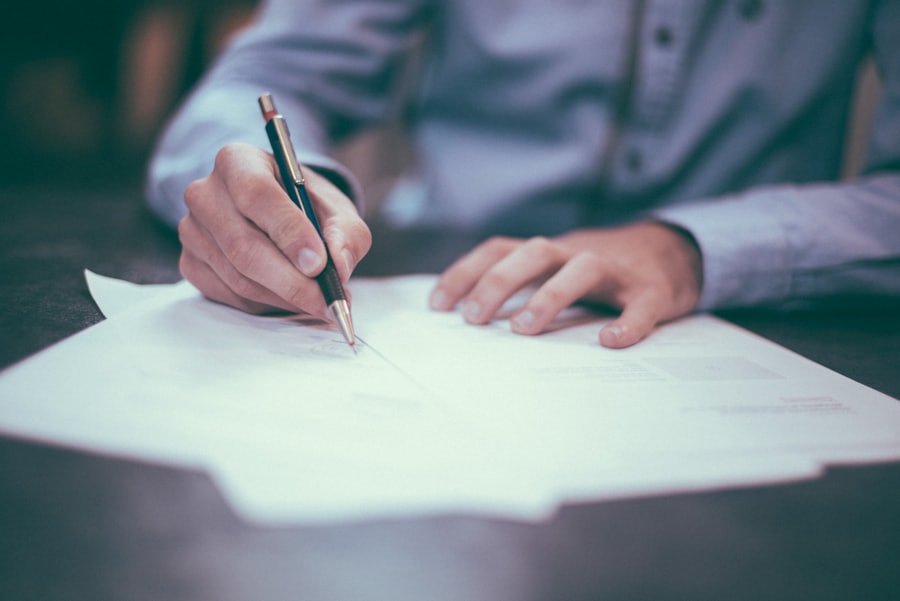 An examiner annotating a script by hand